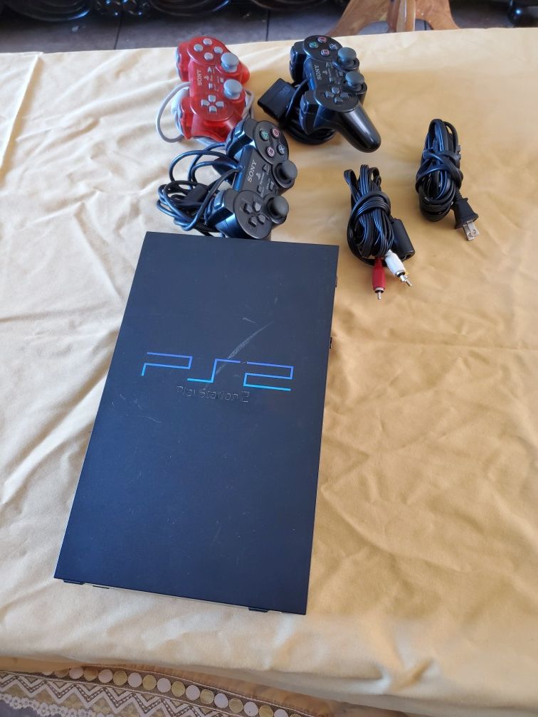 Ps2 console with 3 controllers no games in good condition