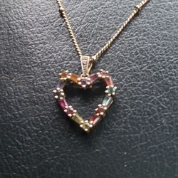 Gold Necklace With A Gold & Stone Pendant 