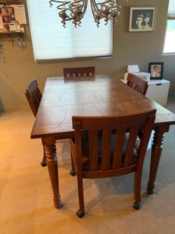 Wood Dining Table with 4 Chairs on wheels