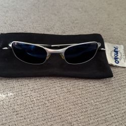 Oakley Children’s Sunglasses Silver With Blue Lenses 