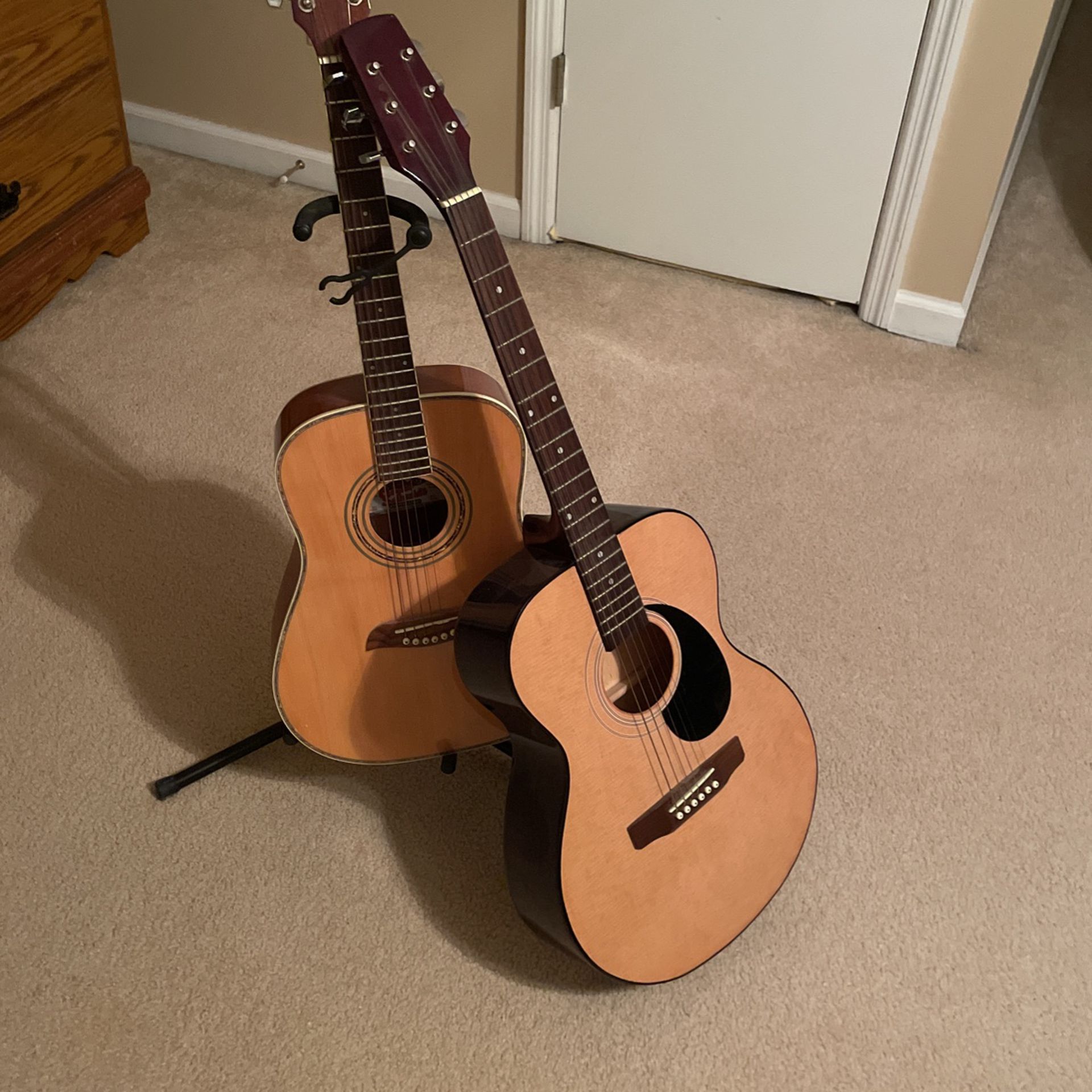 Two Oscar Schmidt Acoustic Guitars + Guitar Stand