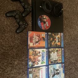 PS4 With Games And Controllers