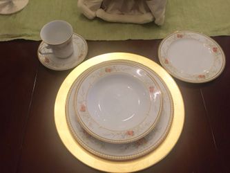 Mikasa China set for 10. Plates, salad bowl, dessert plate, cup and saucer. Mikasa Windsor L9036. Gold chargers not included.