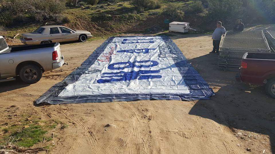 USED BILLBOARD COVERING TARPS EXTRA HEAVY DUTY , INDUSTRIAL STRENGTH 14'ftx48ft BILLBOARD TARP. $75 FOR EACH TARP