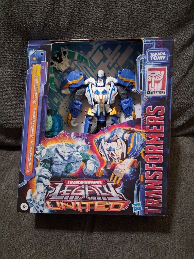 Transformers Legacy United Star Raider Thundertron action figure set.