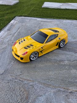 200mm 1/10 Ferrari F599x with front and rear light buckets. RC body shell only