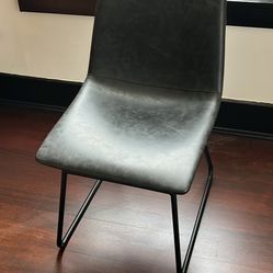 Distressed grey faux-leather chair