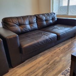 Leather Sofa And Arm Chair From Ashley's Furniture 