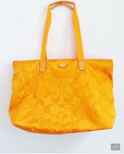 Coach signature getaway packable tote in tangerine