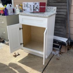 24 In Vanity With Granite Top And Faucet