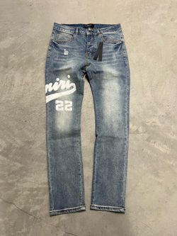 Amiri blue and white jeans