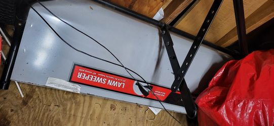 42 inch lawn sweeper like new but needs bagger attachment to catch sweeping 