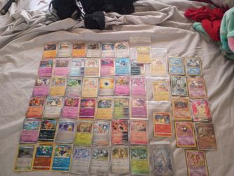 Pokémon Trading Card Lot Mixed Collection/in total about 100 cards all Holo and reversed Holo some of the cards are also  McDonald's promo...and a cou