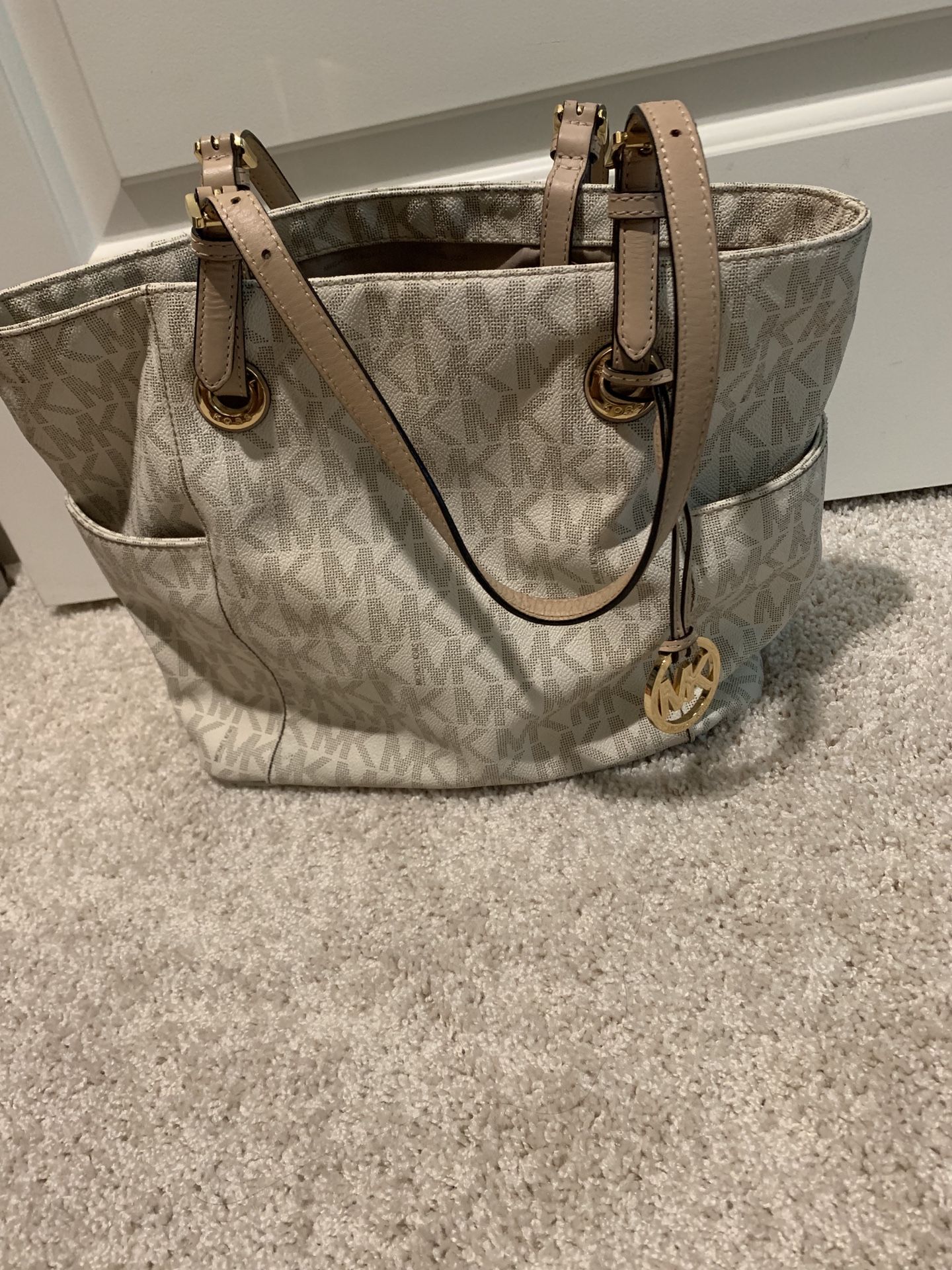 Lightly used authentic MK purse. Need gone ASAP. Make me an offer