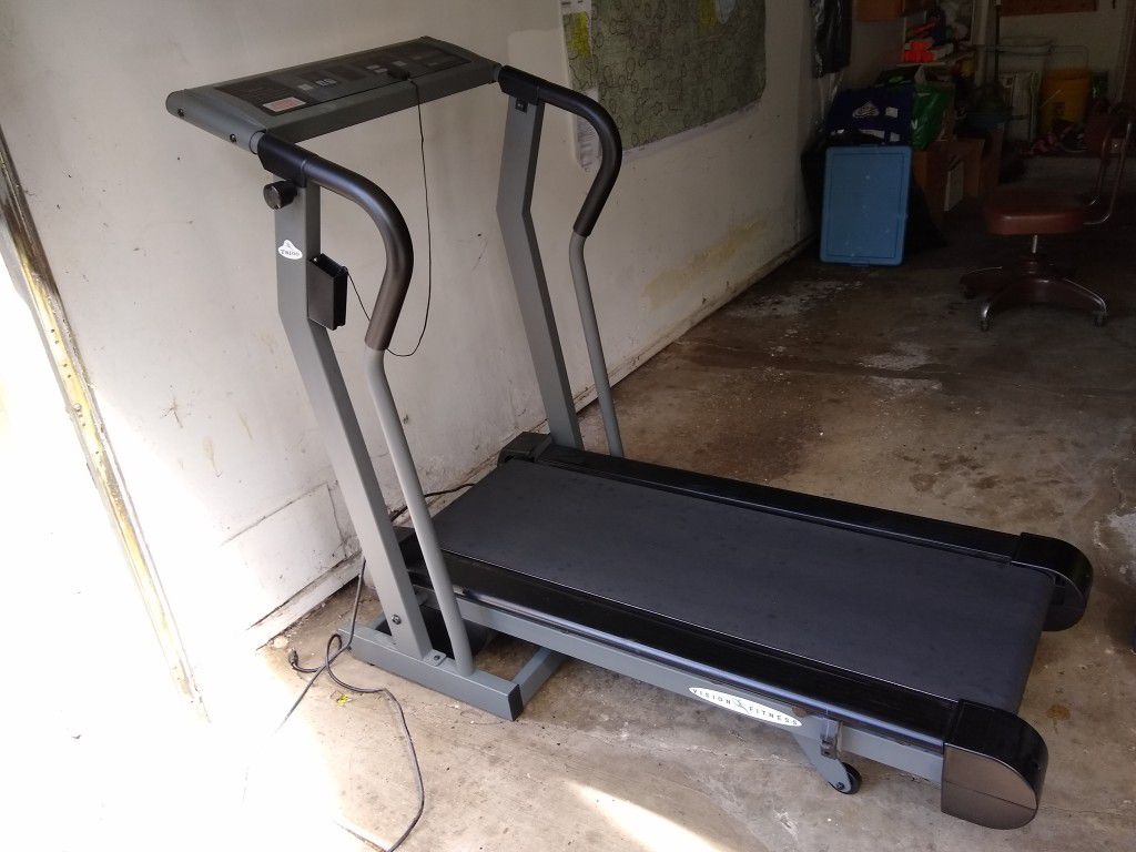 T8100 treadmill (fold up) - good condition