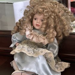 Porcelain Doll with Curls and Lace Dress