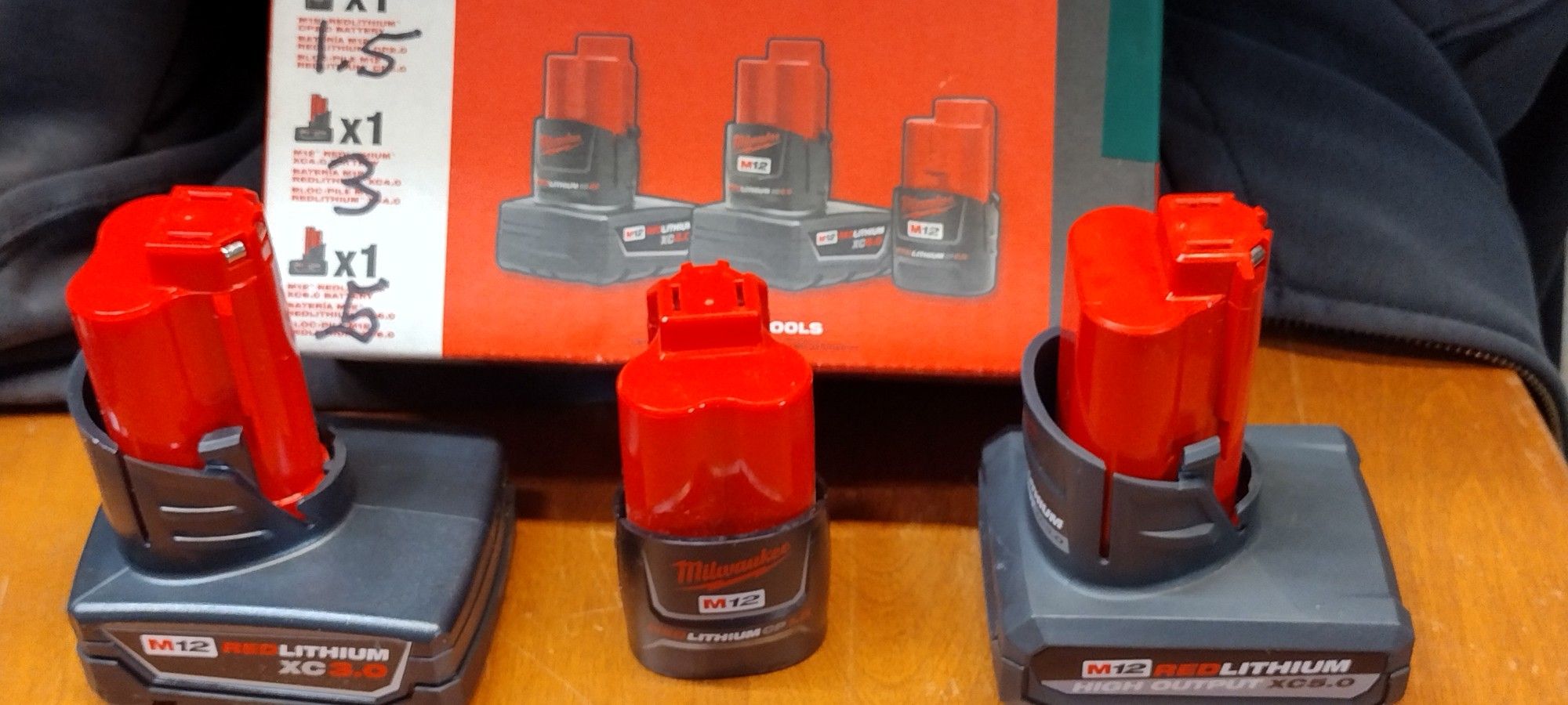 Milwaukee M12 Red lithium New 3 Pack Battery's