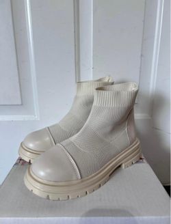 Women boots beige color