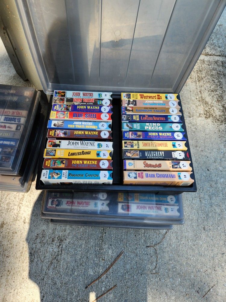 Set Of 100 JOHN WAYNE VHS movies  In Cases