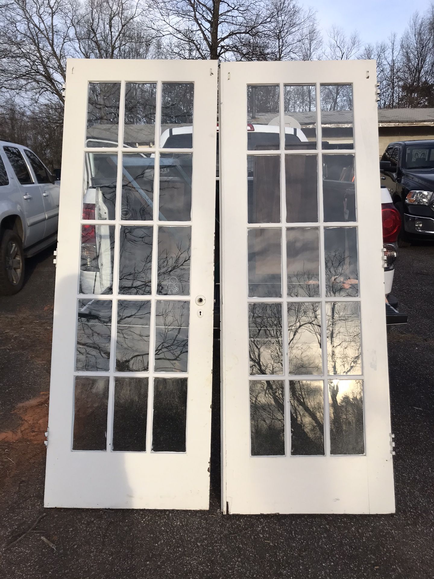 Antique French Doors 15 pane. 7’x 29 1/4”. Very solid. Wavy glass.