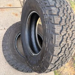 Set Of 2 GENERAL GRABBER A/T X 275/70R18 116S. Both have a patch.