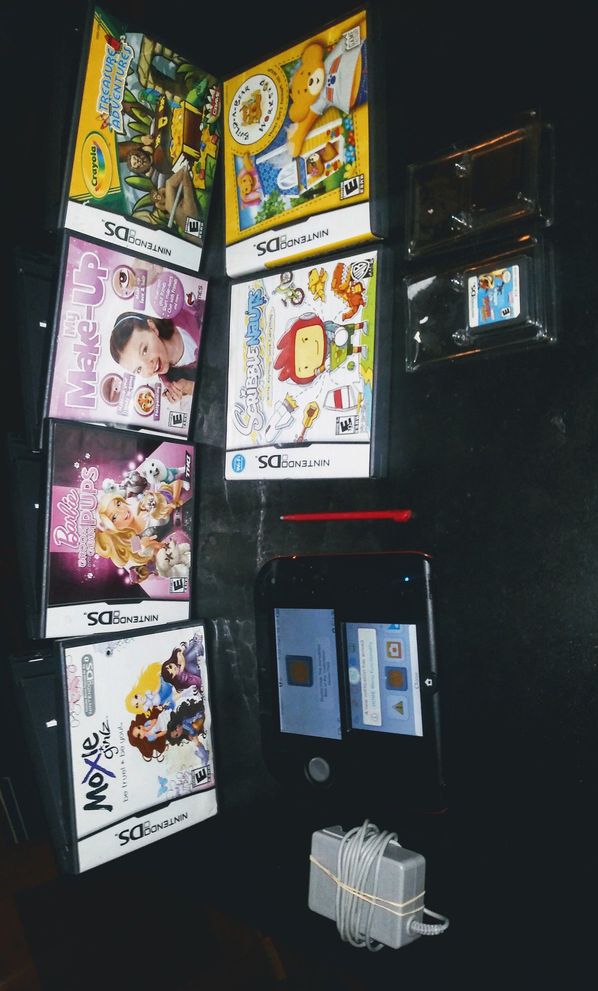 NINTENDO 2DS AND 8 GAMES