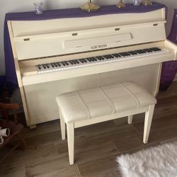White Schumann Upright piano