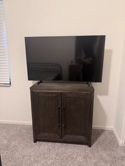 Dark Wood Two-Door Storage Cabinet