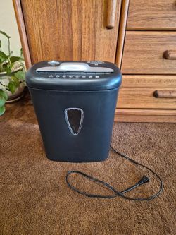 Amazon Basics 8-Sheet Cross-Cut Paper and Credit Card Shredder.