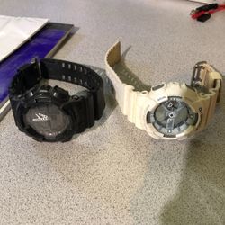 2 G Shocks 
