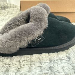Women’s black UGG slippers