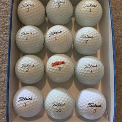1 Dozen of Titleist  Golf Balls (7 Pro V1’s)
