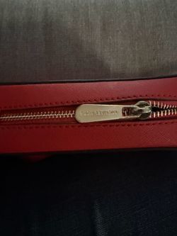 Michael Kors purse in the shade coral