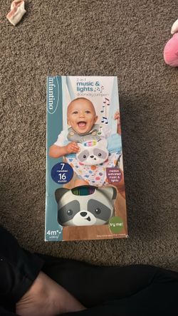 Infantino 2 in 1 music and light doorway jumper