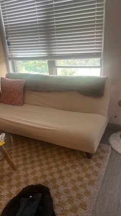 Brown suade leather couch (with white cover)