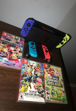 NINTENDO SWITCH with 3 Games and 4 controllers