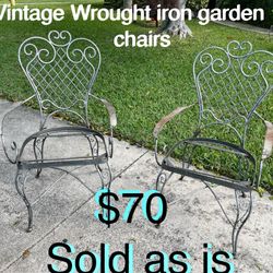 $70 Set of 2 Vintage wrought iron heavy can be painted and restored sold as is