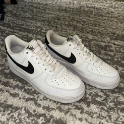 Black and white Nike Air forces 