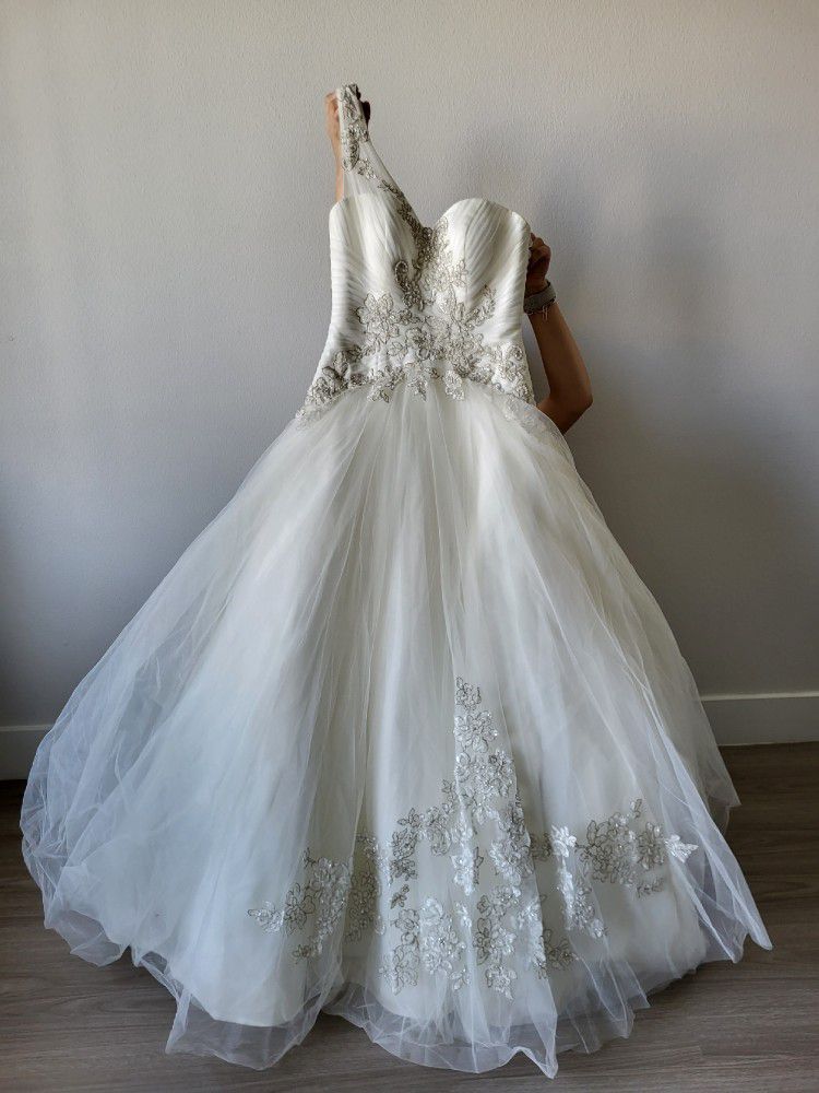 This Dress Was Used Once. It's from David's Bridal, Cost $1,200+taxes.  Asking For $300-500, Price Is Negotiable.  