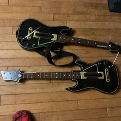 Two Little Guitars With Batteries , Hero Power In Good Conditions (NO SHIPPING) $40 For Both
