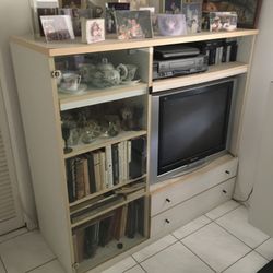 Wall Unit With Glass Door And 6 Sections, 2 Drawers And TV Compartment.