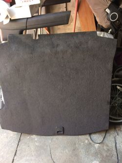 Trunk board cover for the spare tire