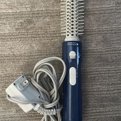 Hair fan with a brash. 