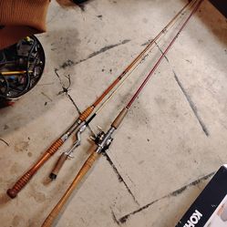 3 rod and a reel ocean fish antique