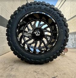 ON SALE. New: TIS 20x10 OR 20x12 wheels 8x165.1 & 35x12.50-20 TOYO OEPN COUNTRY M/T or A/T TIRES For RAM GMC CHEVY HUMMER 8 lug (We Finance)