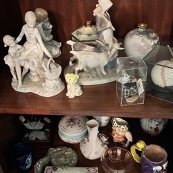Misc Hummel lladro and porcelain dolls and doll domes