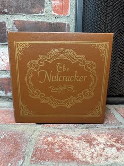 NEW AVON VINTAGE “THE NUTCRACKER" ANIMATED MUSICAL BOOK MUSIC BOX