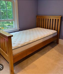 Twin size bed frame with bottom drawers and mattress