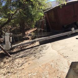 Auto Crane Boom Mount On The Back Of A Work Truck 