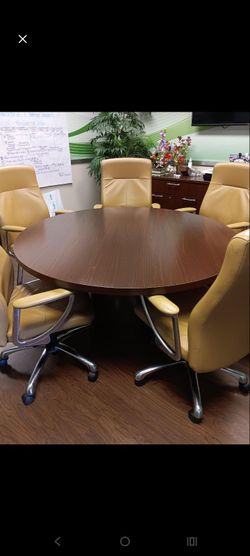 60" wide table round. The chairs not included